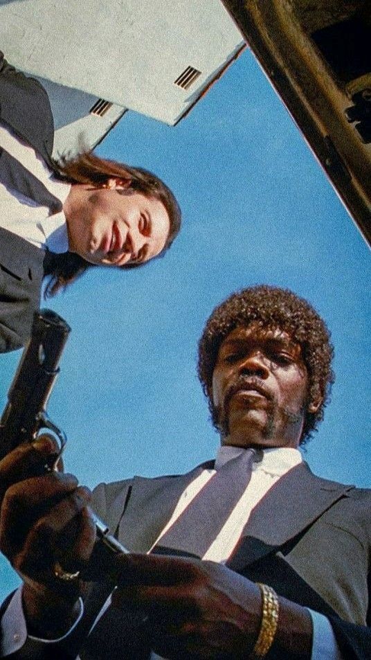 Pulp Fiction low angle shot looking up at two men in suits